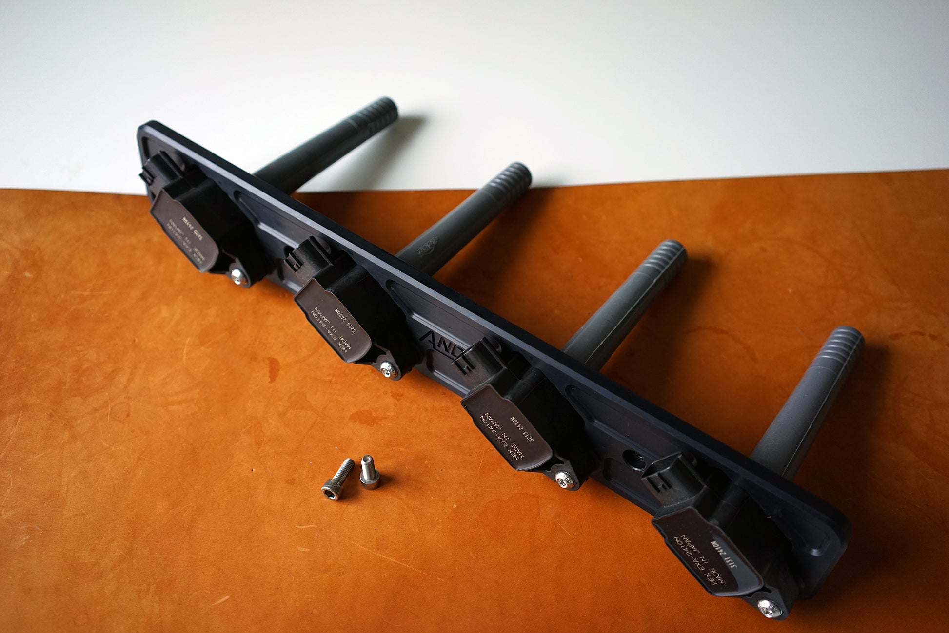 Volvo 16 valve billet coil bracket anodized black. gtr coil conversion b234 redblock Coil On Plug. Smart coil Conversion