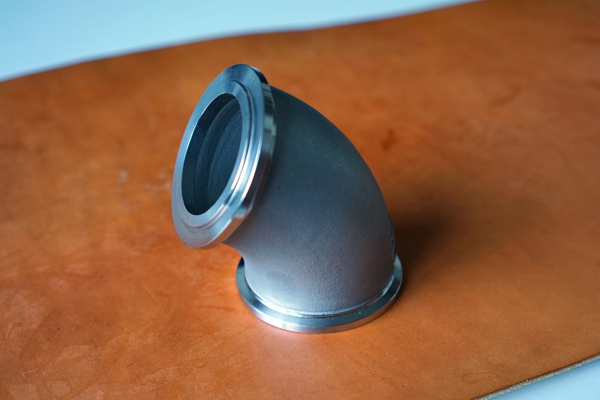 Ando Engineering 60-degree wastegate relocation elbow in cast stainless steel for turbocharger and 45mm wastegate systems